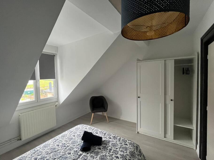 Posteľ alebo postele v izbe v ubytovaní Appartement T3 rénové 60m2 proche centre Colmar