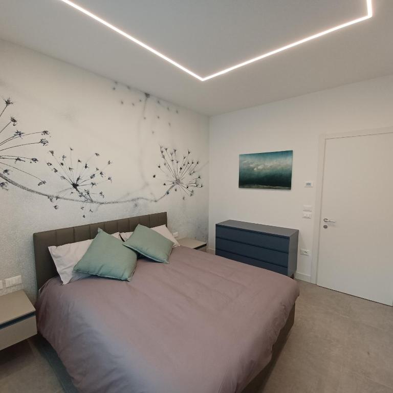 Postel nebo postele na pokoji v ubytování Casa Ciliegi 3