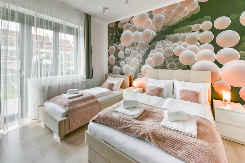 Posteľ alebo postele v izbe v ubytovaní Villa Garden