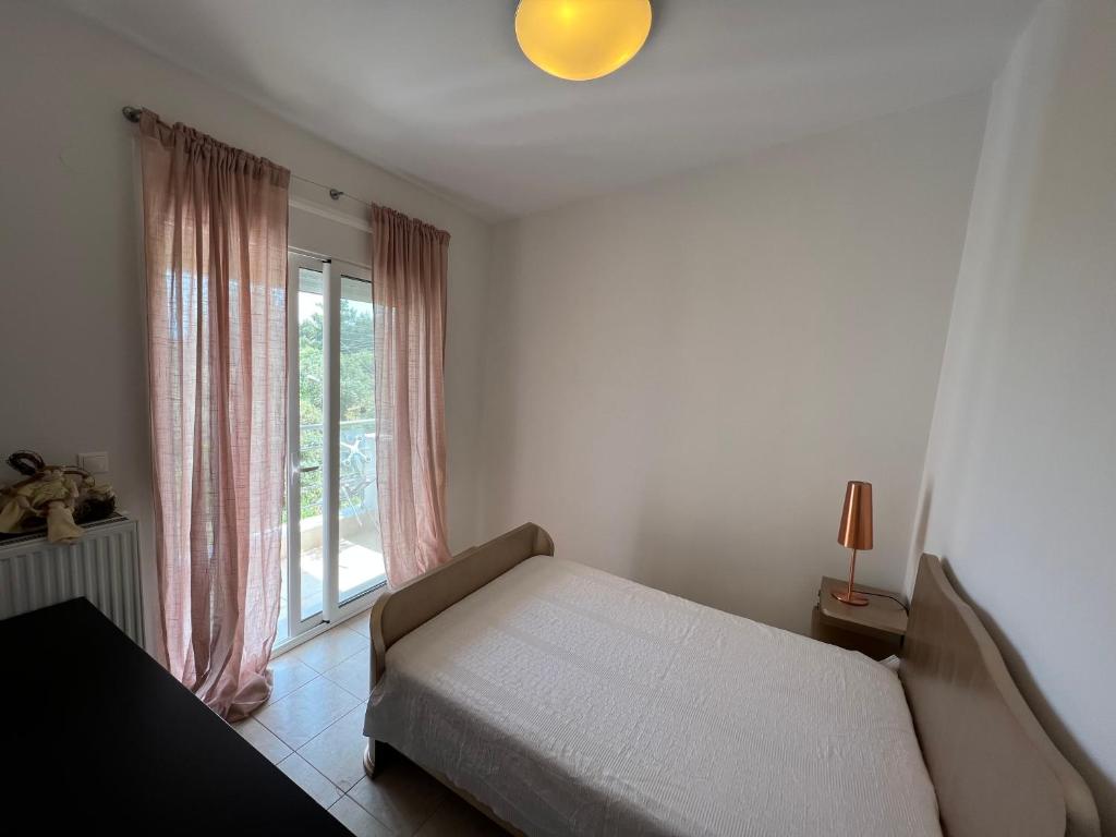Postel nebo postele na pokoji v ubytování DolceVita Villa
