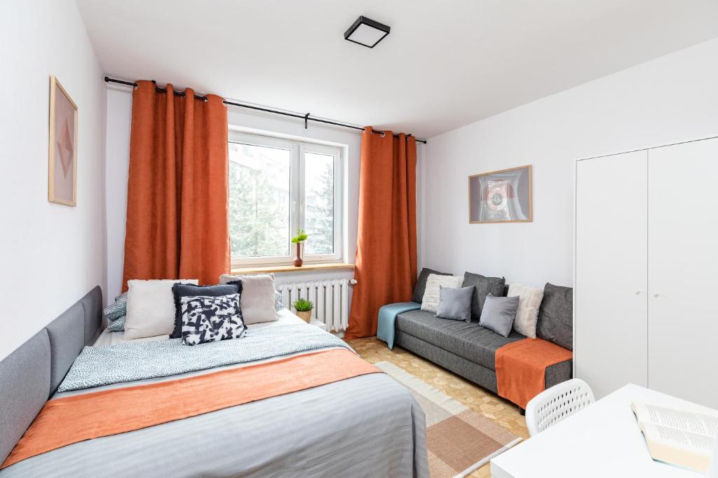 Posteľ alebo postele v izbe v ubytovaní ROOM Bohaterów Września