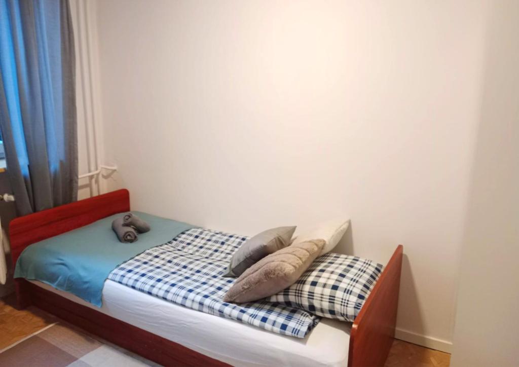 Posteľ alebo postele v izbe v ubytovaní ROOM Bohaterów Września