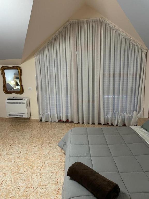 Postel nebo postele na pokoji v ubytování Maison Centre