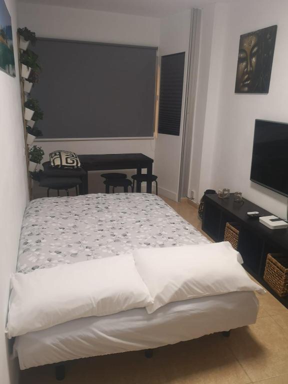 Posteľ alebo postele v izbe v ubytovaní BKD1 - Apartamento entero a 50 metros PLAYA DE LAS CANTERAS