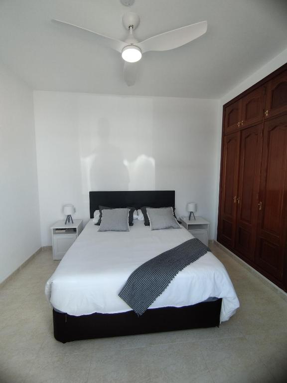 A bed or beds in a room at Villa Harena