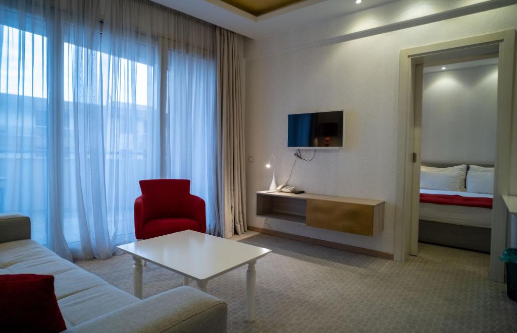 Postel nebo postele na pokoji v ubytování Hotel Atina