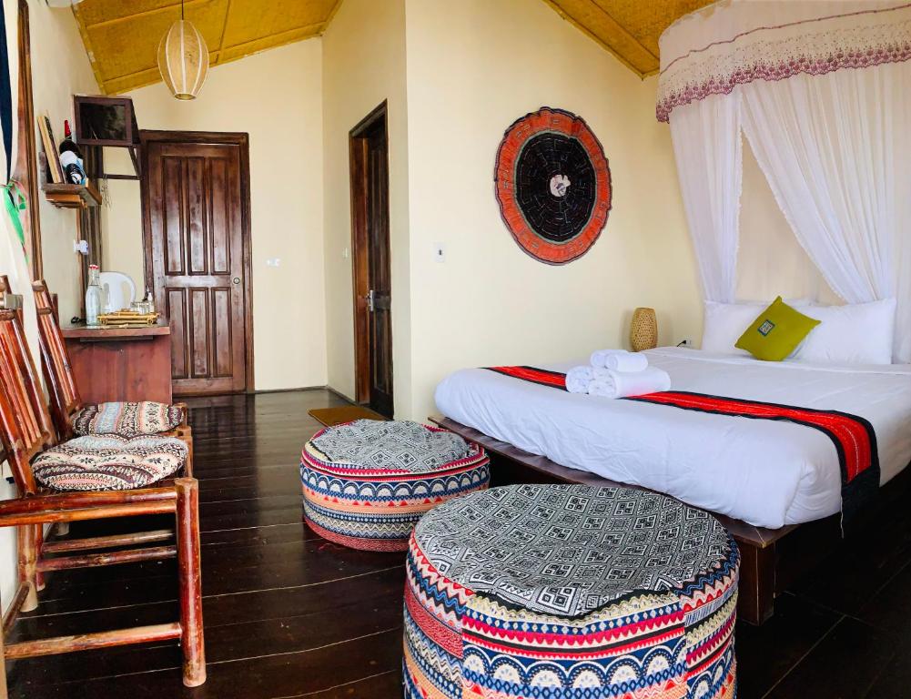 Giường trong phòng chung tại Sapa Rosie House