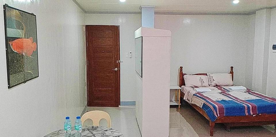 Postel nebo postele na pokoji v ubytování ZM Residence