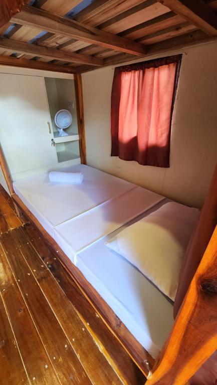 Postel nebo postele na pokoji v ubytování Dam Dam Hostel