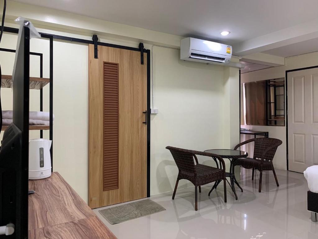 Posezení v ubytování Petchsiri Boutique Hotel เพชรสิริ บูทิค