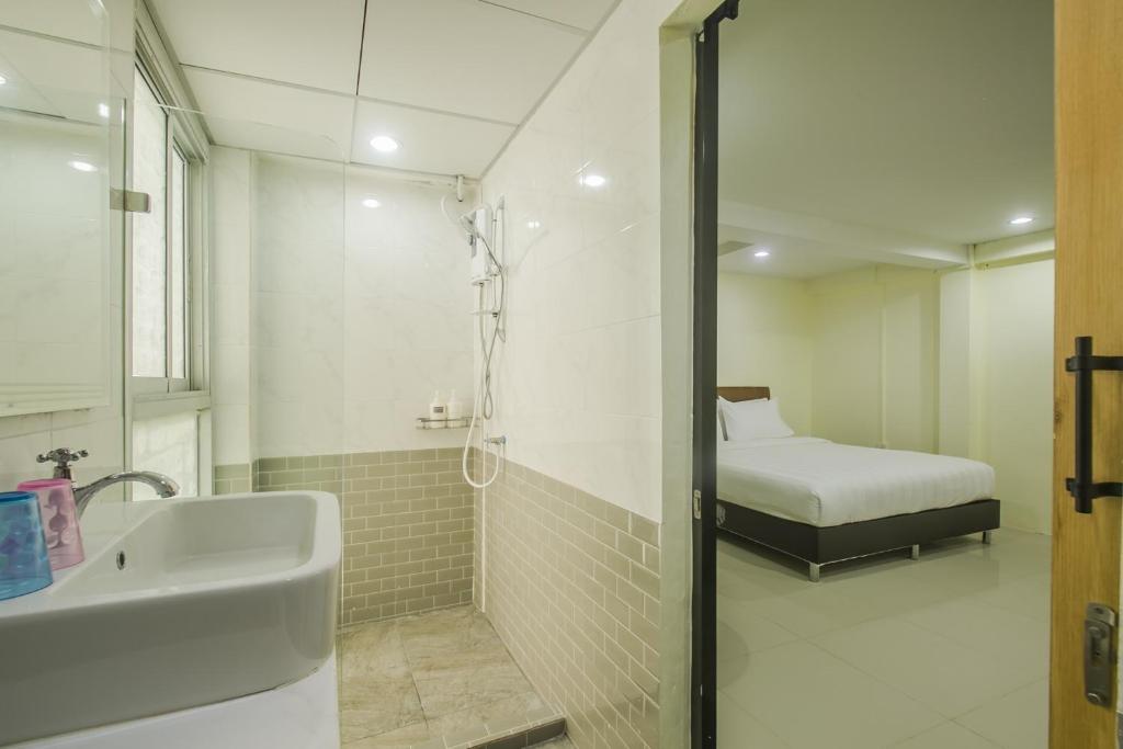 Koupelna v ubytování Petchsiri Boutique Hotel เพชรสิริ บูทิค