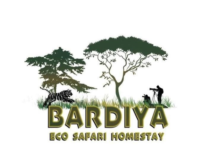 un logo de safari avec un zèbre et un arbre dans l'établissement Bardiya Eco Safari Homestay, à Bhurkīā