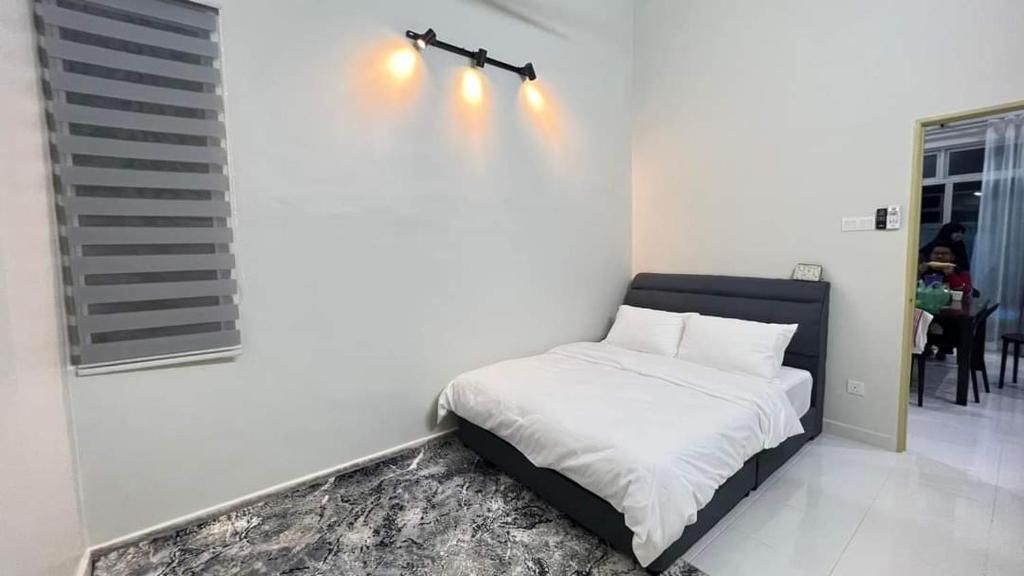 Postel nebo postele na pokoji v ubytování El Manzil Homestay with Pool