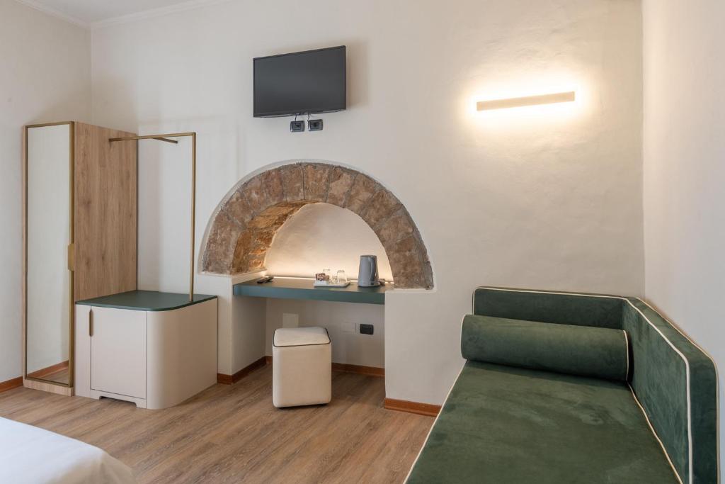 TV a/nebo společenská místnost v ubytování Hotel Gattapone