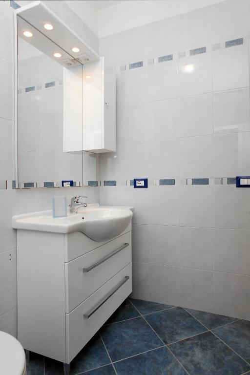 Koupelna v ubytování Residence La Pigna