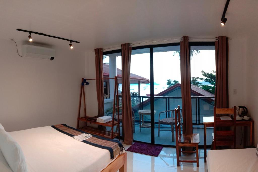 Cama o camas de una habitación en Corong Beach Resort