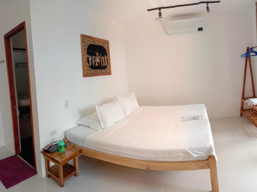Corong Beach Resort - Deluxe Drievoudige Kamer Met Uitzicht Op Zee