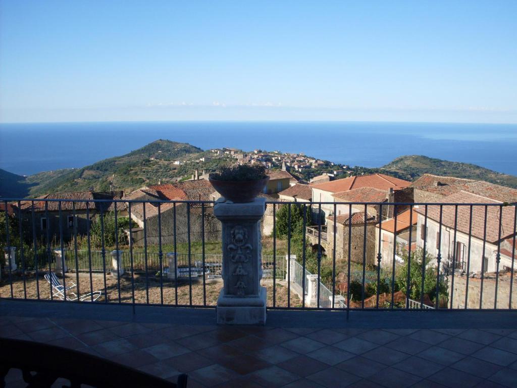 a balcony with a view of the ocean at Il Ritrovo degli Angeli in San Mauro Cilento