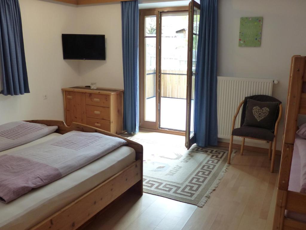 Postel nebo postele na pokoji v ubytování Apartment Telser