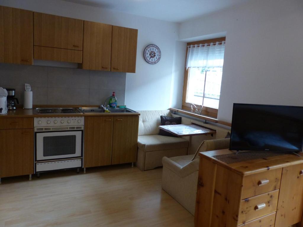 Kuchyň nebo kuchyňský kout v ubytování Apartment Telser