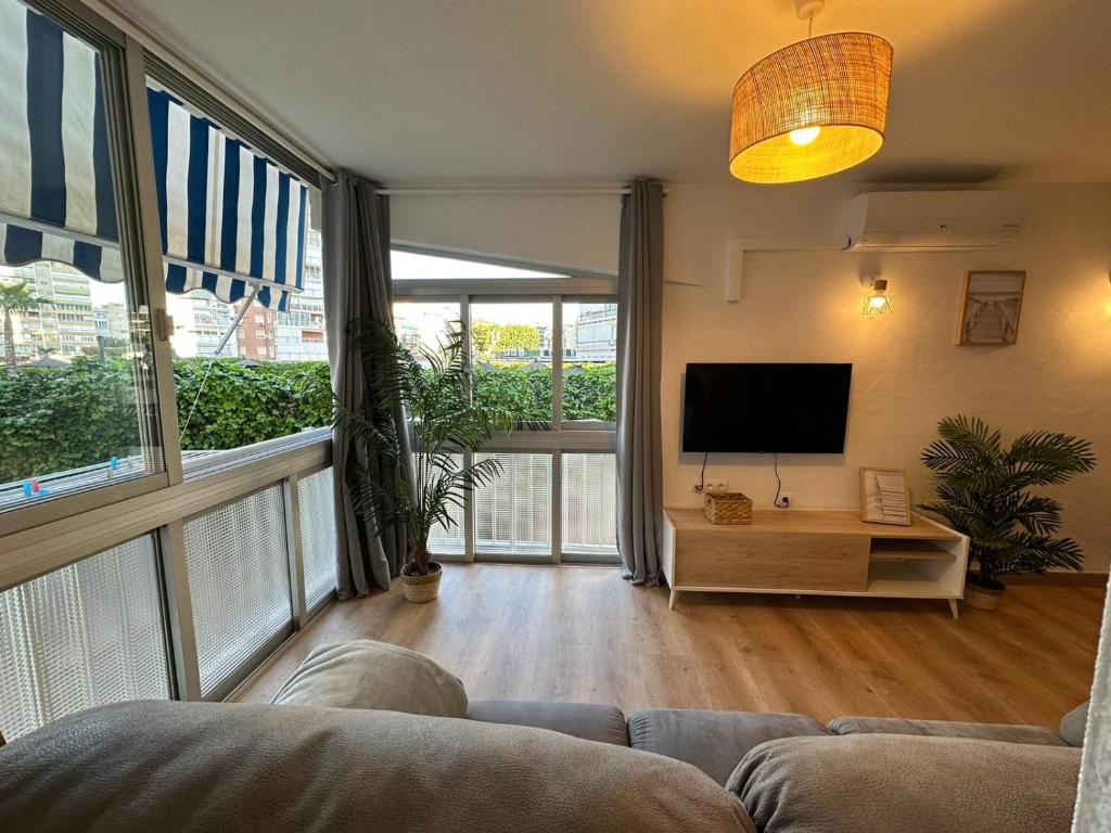 TV a/nebo společenská místnost v ubytování Apartamento Marval PLAYA DE LEVANTE
