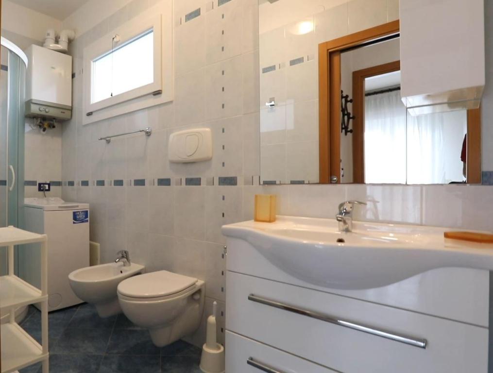 Koupelna v ubytování Residence La Pigna