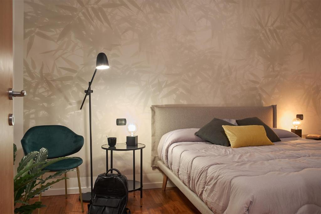 A bed or beds in a room at Bamboo Suite Zona Ripamonti-IEO