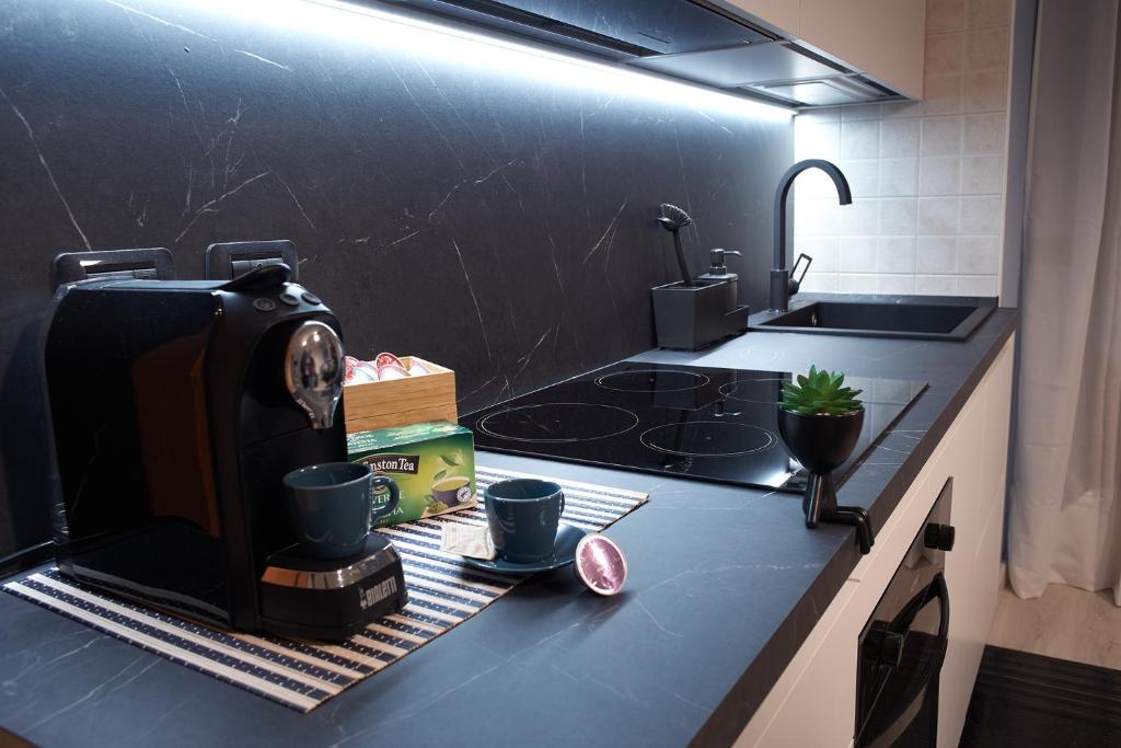A kitchen or kitchenette at Bamboo Suite Zona Ripamonti-IEO