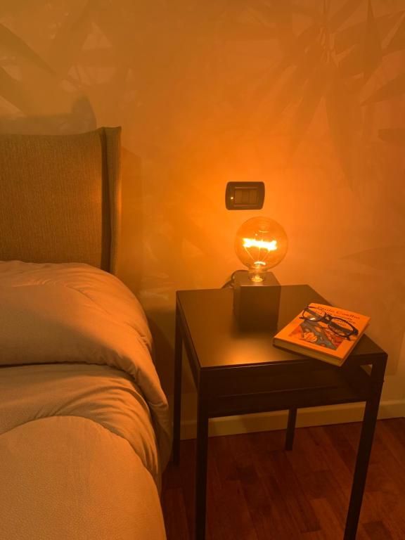 A bed or beds in a room at Bamboo Suite Zona Ripamonti-IEO