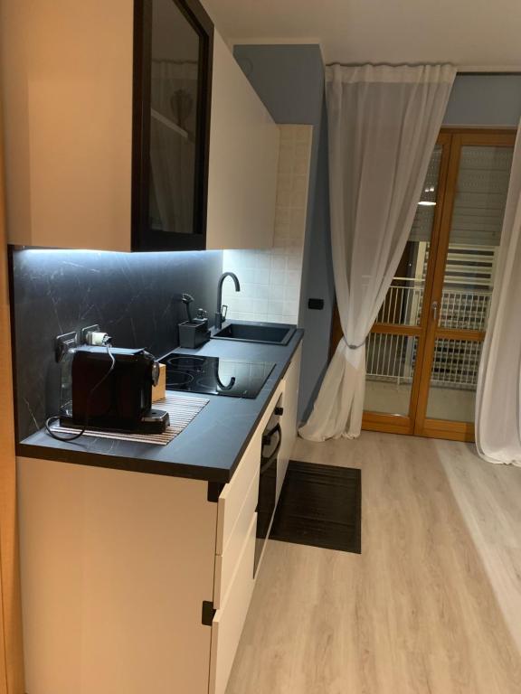 A kitchen or kitchenette at Bamboo Suite Zona Ripamonti-IEO