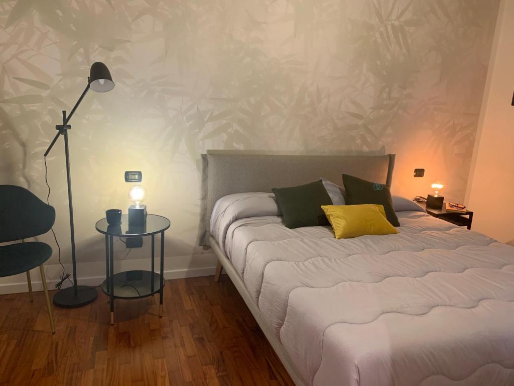 A bed or beds in a room at Bamboo Suite Zona Ripamonti-IEO