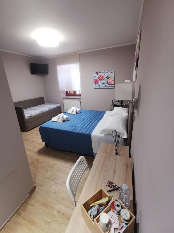 Postel nebo postele na pokoji v ubytování LucyBen GuestHouse