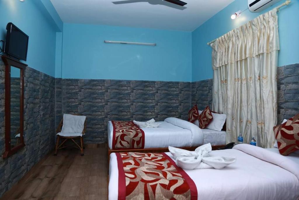 Postel nebo postele na pokoji v ubytování Hotel Center Inn Lake