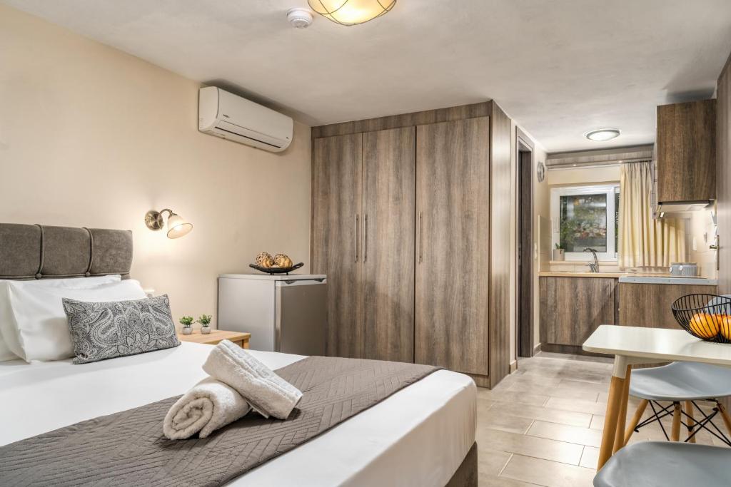 Postel nebo postele na pokoji v ubytování Villa Dionysios