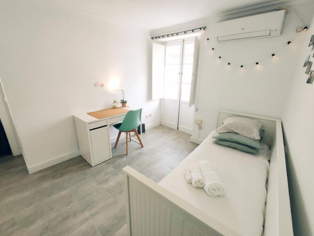 Postel nebo postele na pokoji v ubytování Casa Alameda
