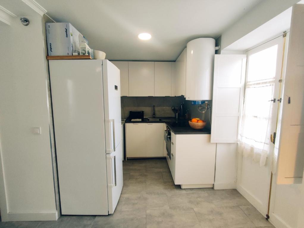 Kuchyň nebo kuchyňský kout v ubytování Casa Alameda