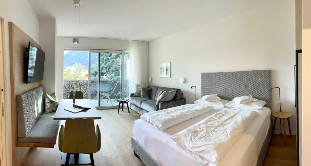 Postel nebo postele na pokoji v ubytování Hotel Gartenresidence Zea Curtis