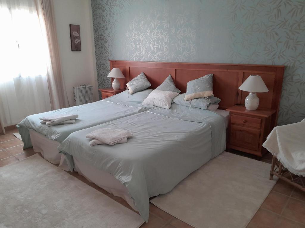 Posteľ alebo postele v izbe v ubytovaní Casa Gregory