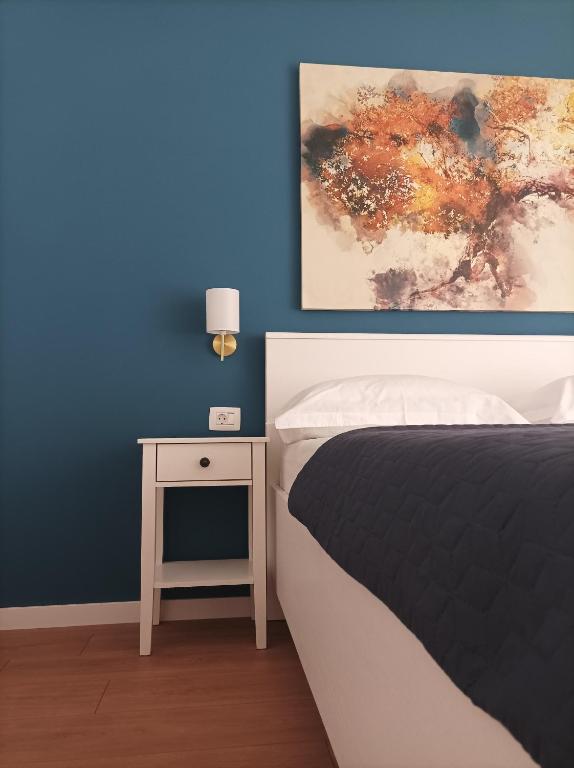 Postel nebo postele na pokoji v ubytování Neda Apartmani