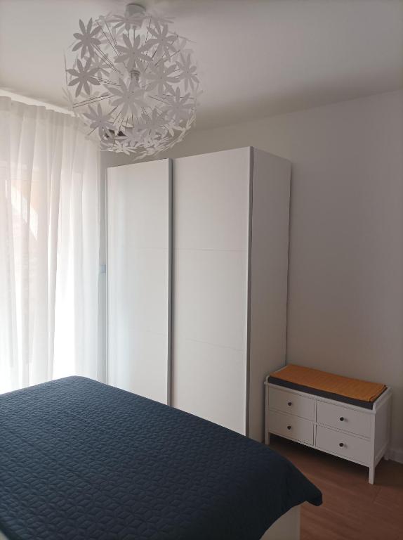 Postel nebo postele na pokoji v ubytování Neda Apartmani