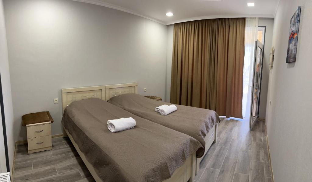 Postel nebo postele na pokoji v ubytování Hotel Vardzia Terrace