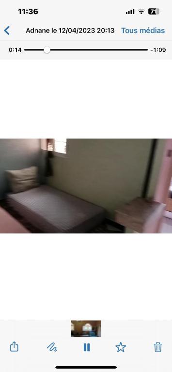 a screenshot of a website with a picture of a room at Tichka in Ouarzazate