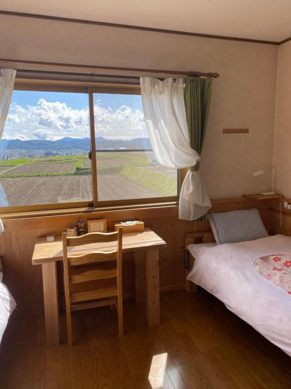 Postel nebo postele na pokoji v ubytování Azumino Backpackers 山の風