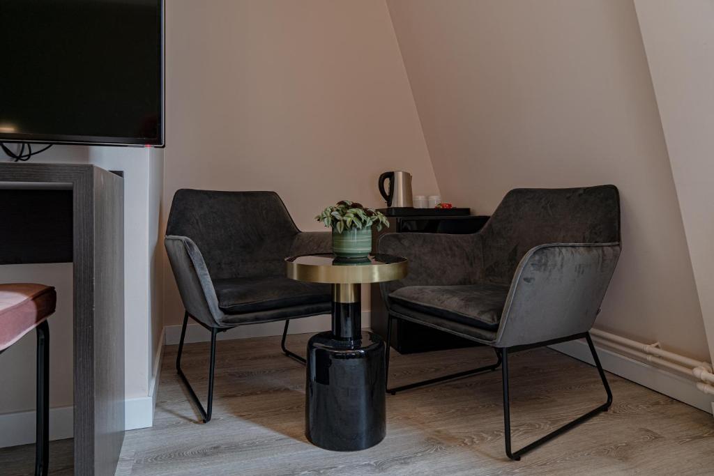 Posezení v ubytování Hotel de Duif Lisse - Keukenhof