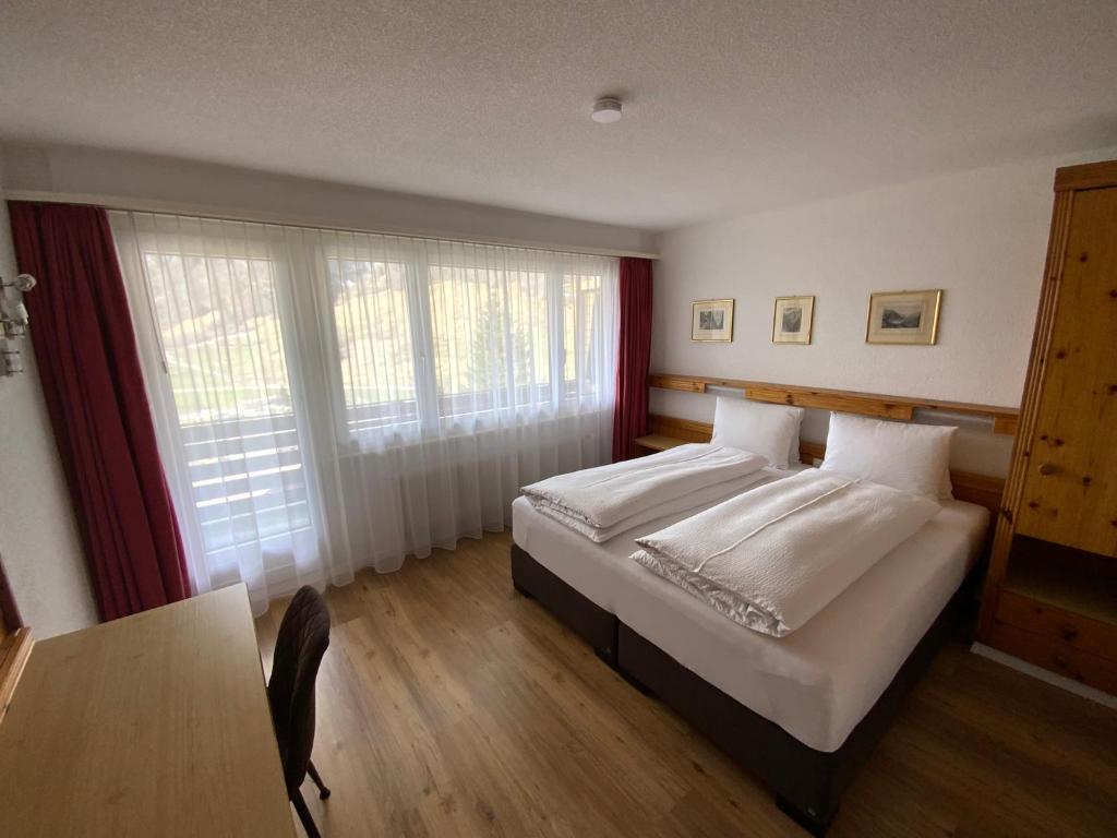 Postel nebo postele na pokoji v ubytování Alfa Appartements Superior