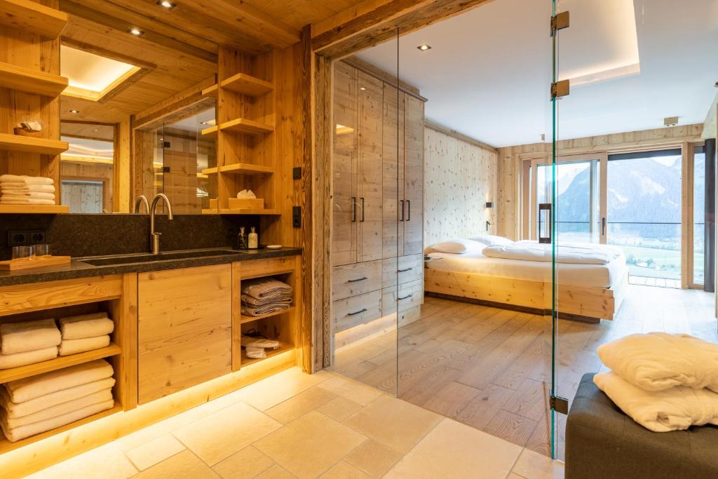Voodi või voodid majutusasutuse Chalet Residenz Zillertal Mühlermoos toas