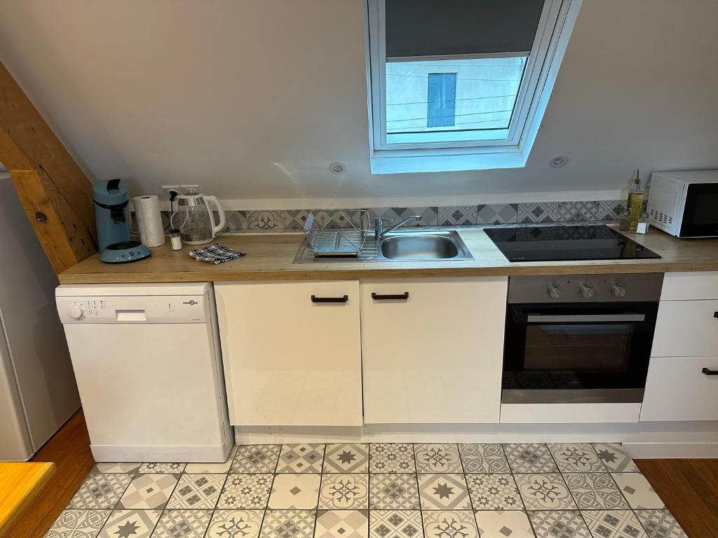Kuchyňa alebo kuchynka v ubytovaní Superbe appartement proche centre ville, thermes