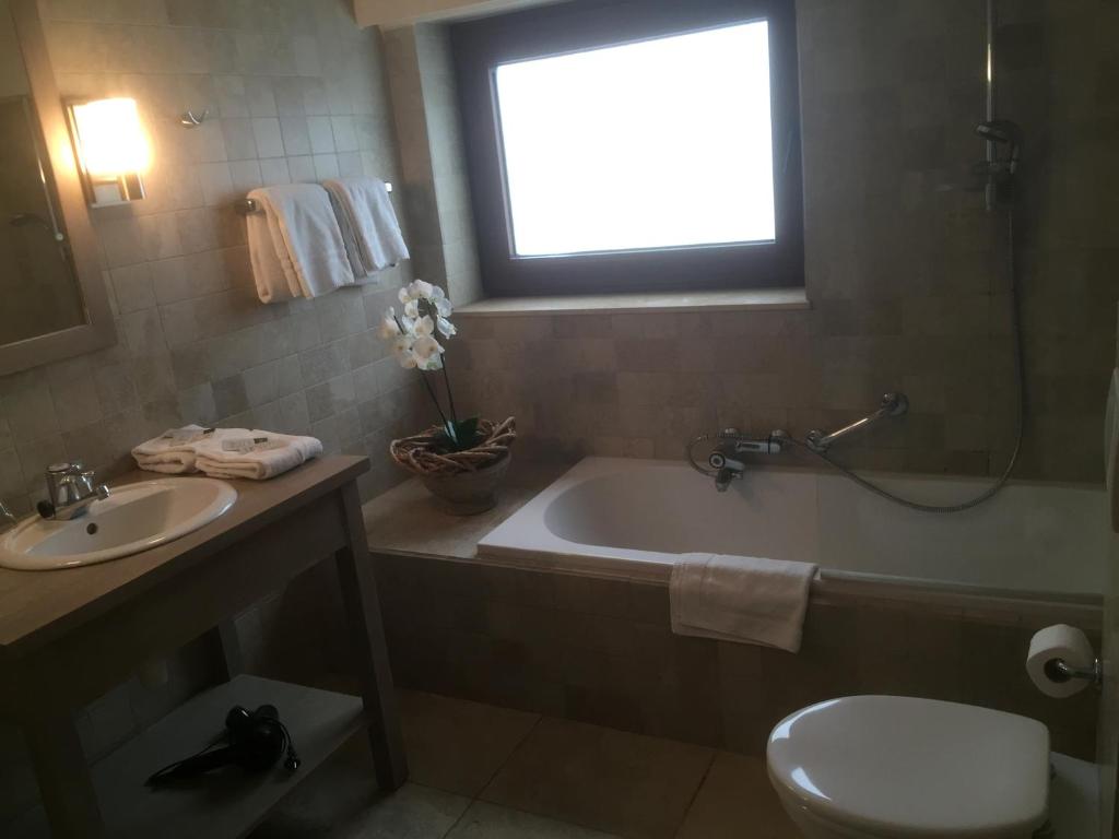 Koupelna v ubytování Hotel Atlas