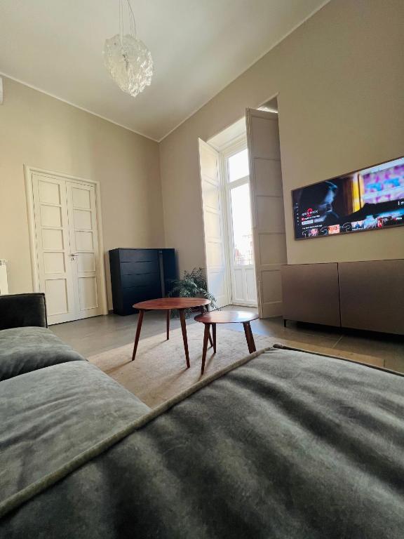 A television and/or entertainment centre at Catania Rooms