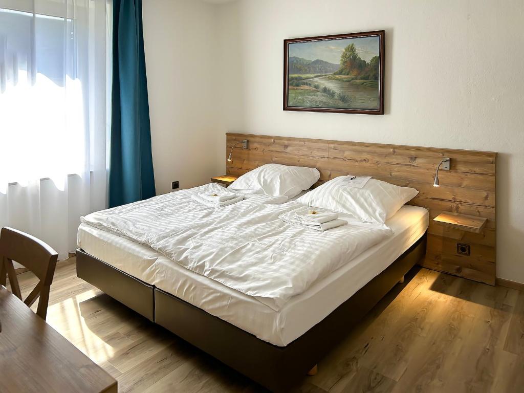 Postel nebo postele na pokoji v ubytování Keller Höhe